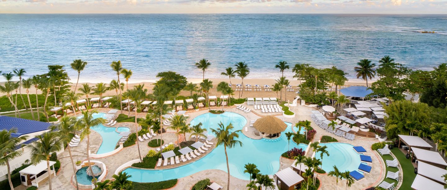 Pool area and view of the ocean from the Fairmont El San Juan hotel